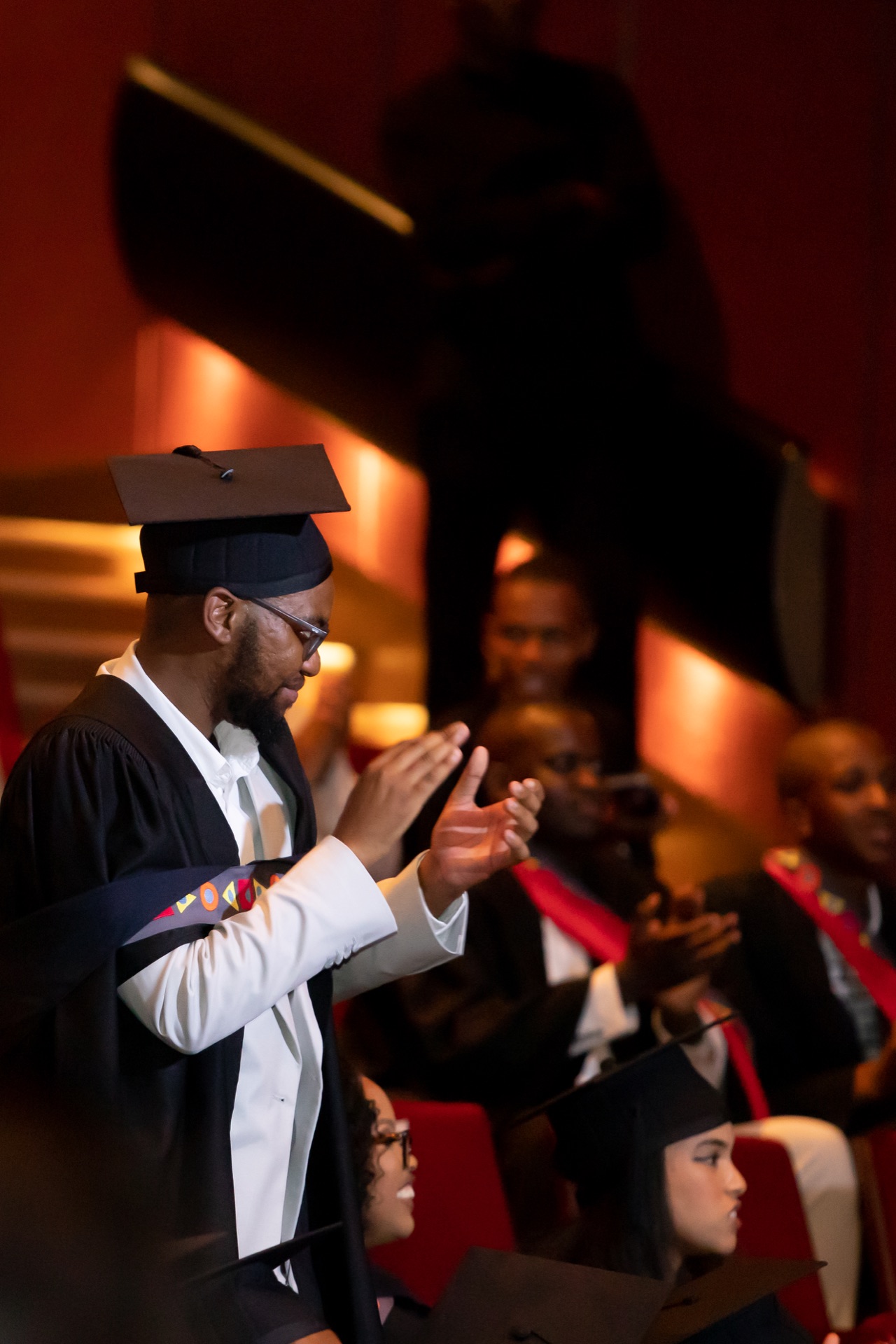 TSIBA graduate applauding at the conferment ceremony